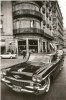 Foto antigua Madrid con Cadillac y Siata Turisa con hard top al fondo.jpg